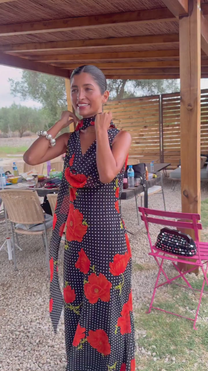 Try-on of the Black Poppy Sophie Dress showing the low V back, bias-cut drape and detachable scarf